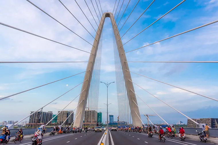 With modern cable-stayed architecture, Thu Thiem Bridge stands out among the Saigon river scene.