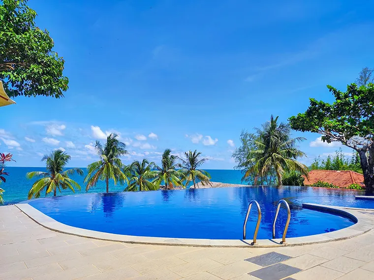 Outdoor infinity swimming pool at the resort
