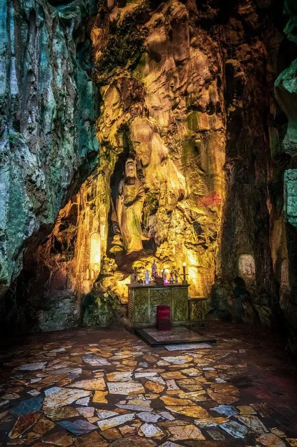 Hoa Nghiem Cave is located within the Marble Mountains complex.