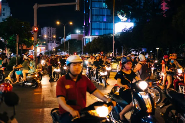 Exploring the streets of Saigon by motorbike at night is a unique experience. - Photo Source: iStock