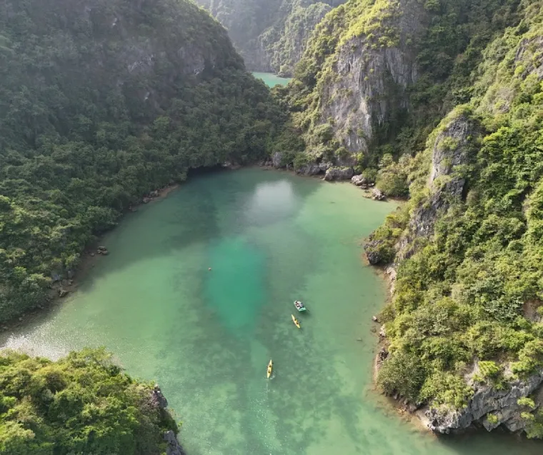 Nearby attractions include Bai Tu Long Bay, Bai Tu Long National Park, caves, temples, and serene beaches