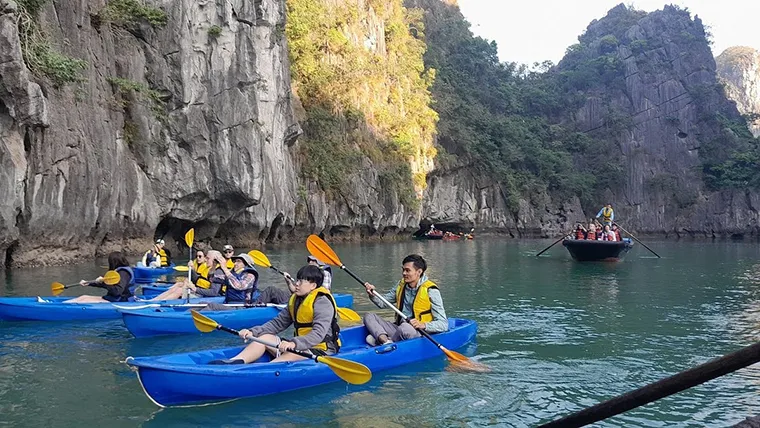 Vistior can try kayaking to explore the majestic limestone karsts and hidden caves that define the landscape 