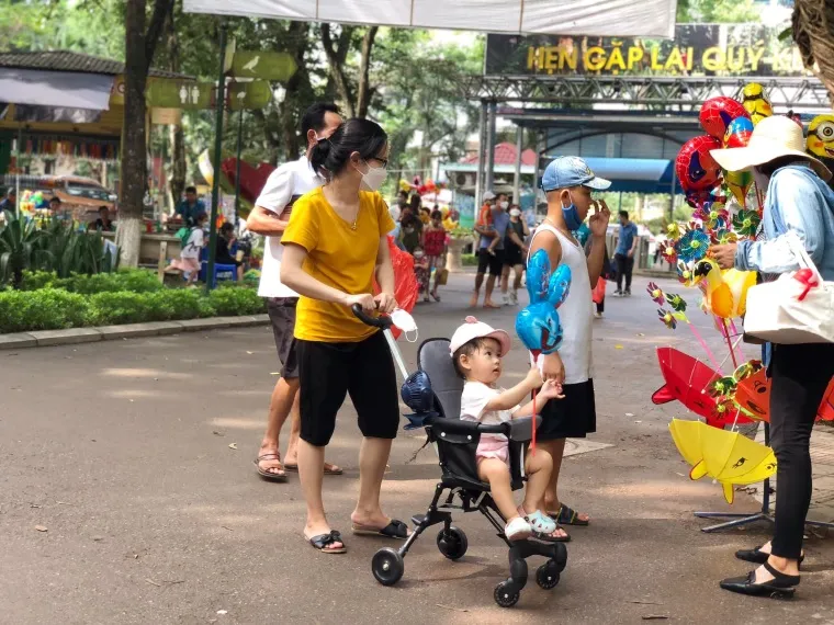 Thu Le Park offers a peaceful getaway with shady trees and family-friendly fun. - Facebook Công viên Thủ Lệ