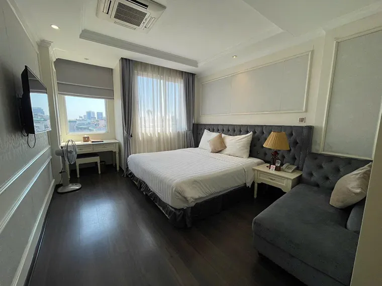 Modern interior combined with neoclassical style in the hotel room