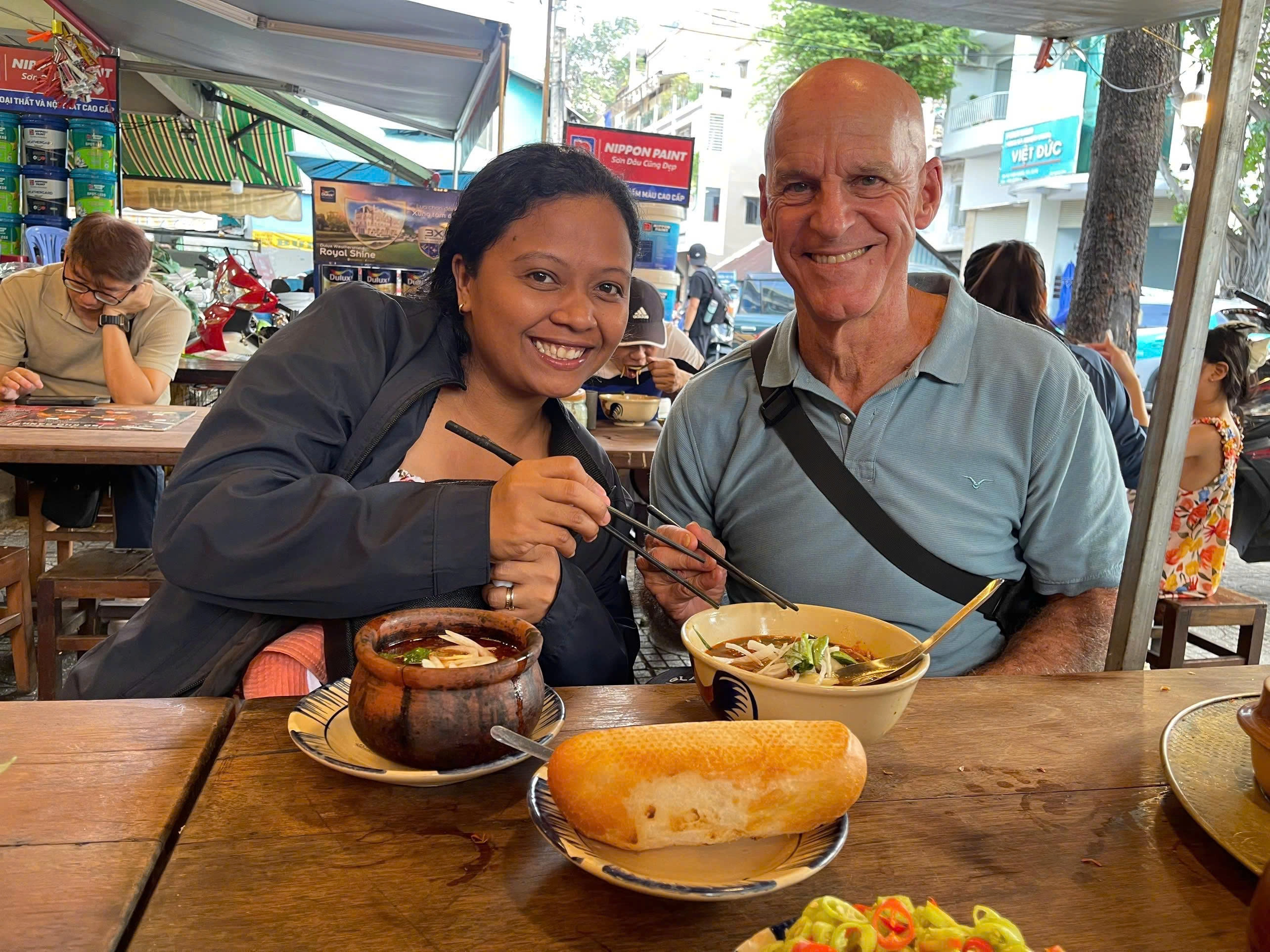 Day Tour | Ao Dai Girls Tour: Saigon Sightseeing and Street Food Experience by Motorbike