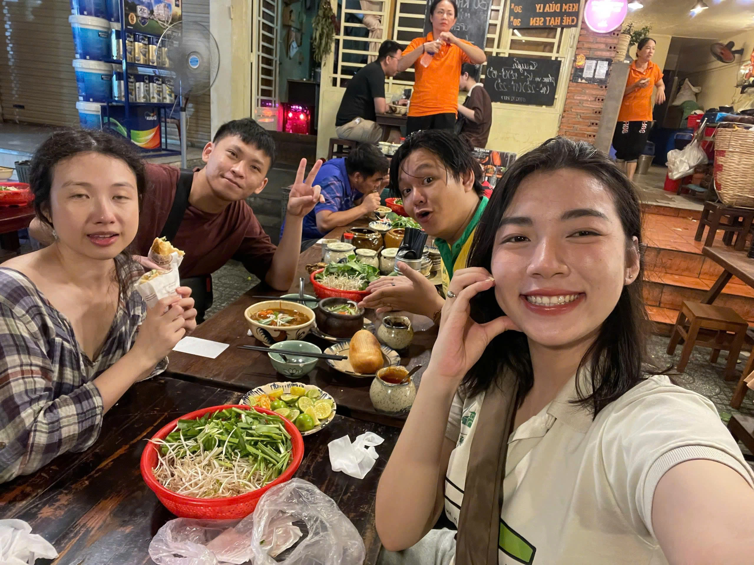Day Tour | Ao Dai Girls Tour: Saigon Sightseeing and Street Food Experience by Motorbike
