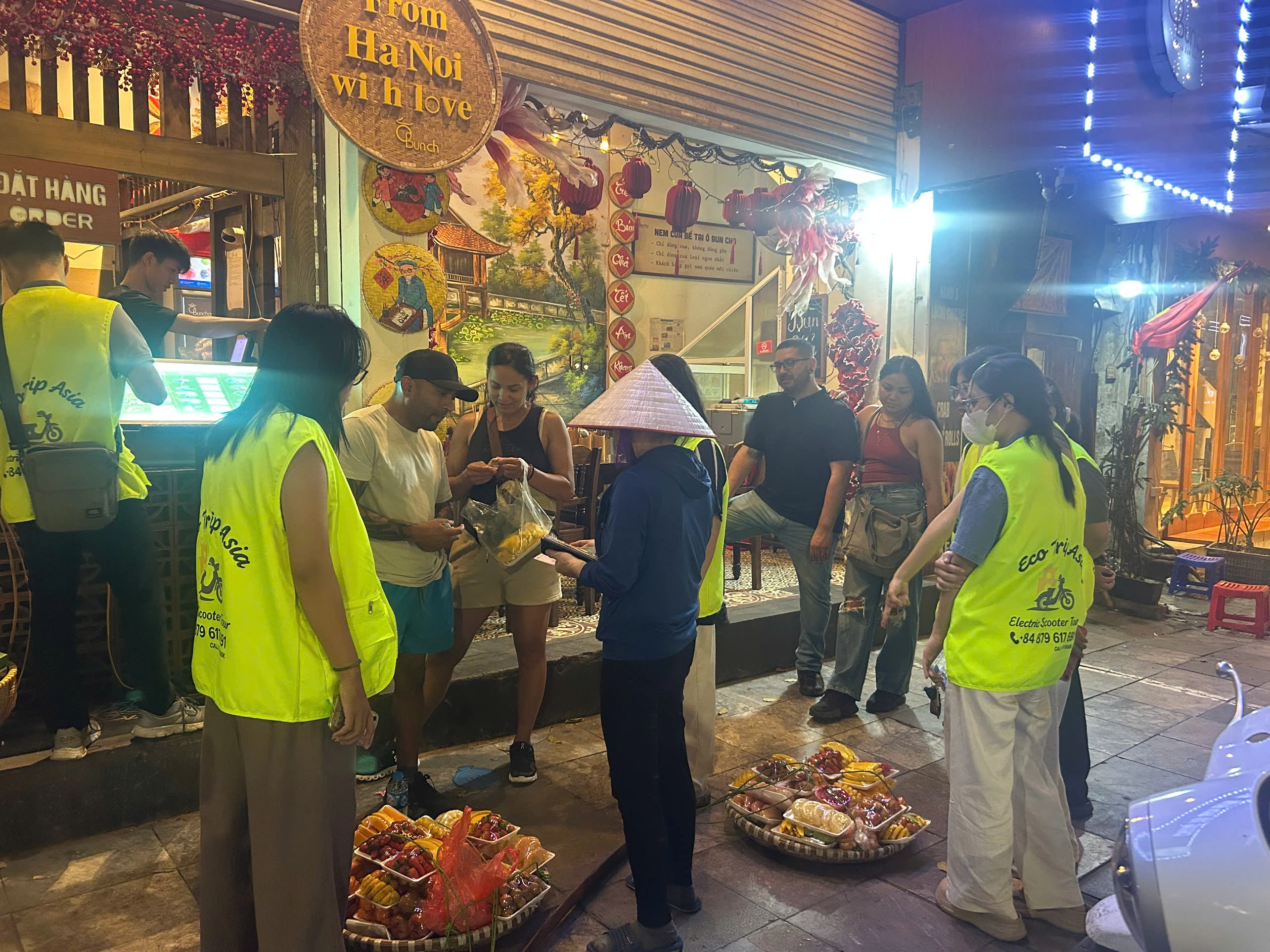 Eco Tour | Ha Noi Streetfood Tour by  E-Motorbike with Ao Dai Female Riders