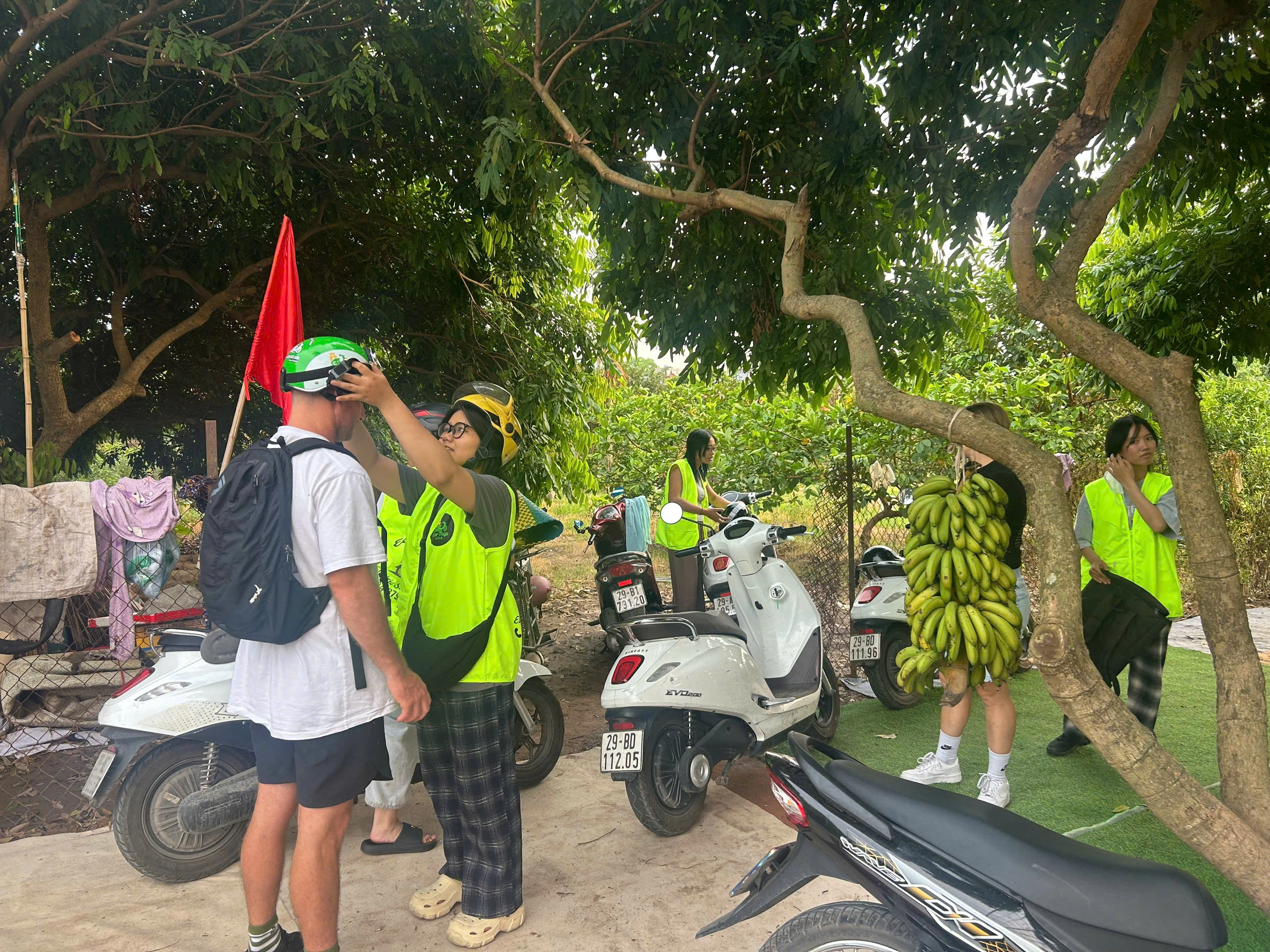 Eco Tour | Ha Noi Streetfood Tour by  E-Motorbike with Ao Dai Female Riders