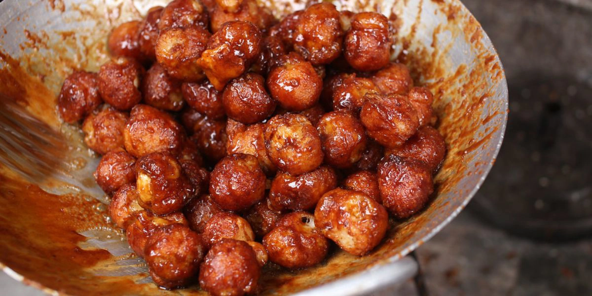 Molasses-glazed sticky rice balls