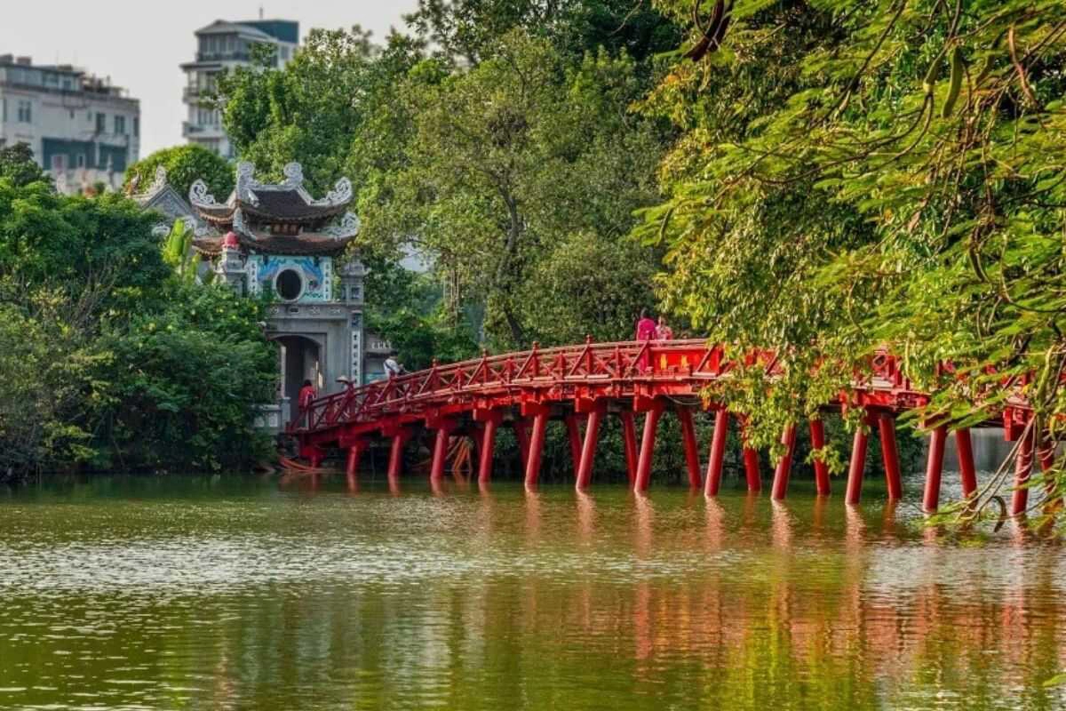 Visit Ngoc Son Temple via the iconic Huc Bridge