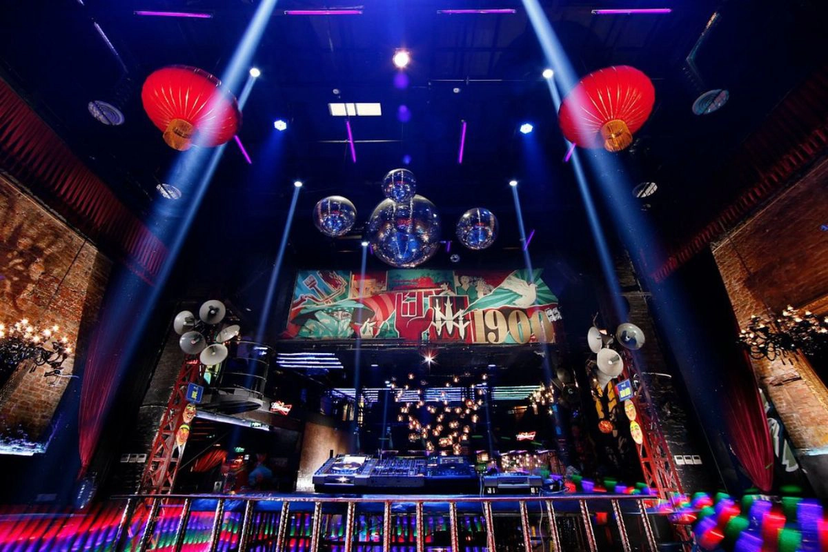 High energy club crowds dance to electronic music late into the night