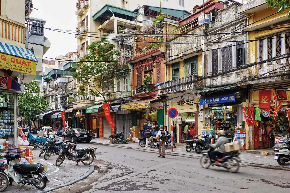 Narrow streets filled with vendors in the Old Quarter