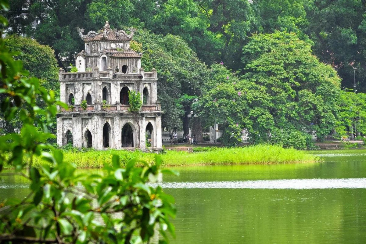 The Turtle Tower standing in the middle of Hoan Kiem Lake