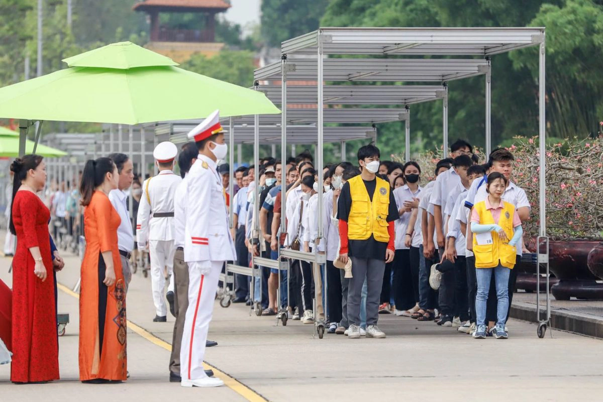 Modest clothing is essential for Hanoi cultural sites