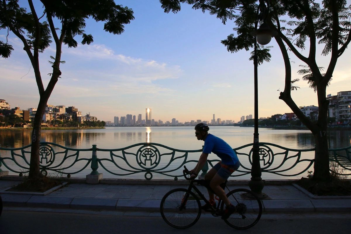 Cyclists navigating safely and confidently along the designated paths near the water