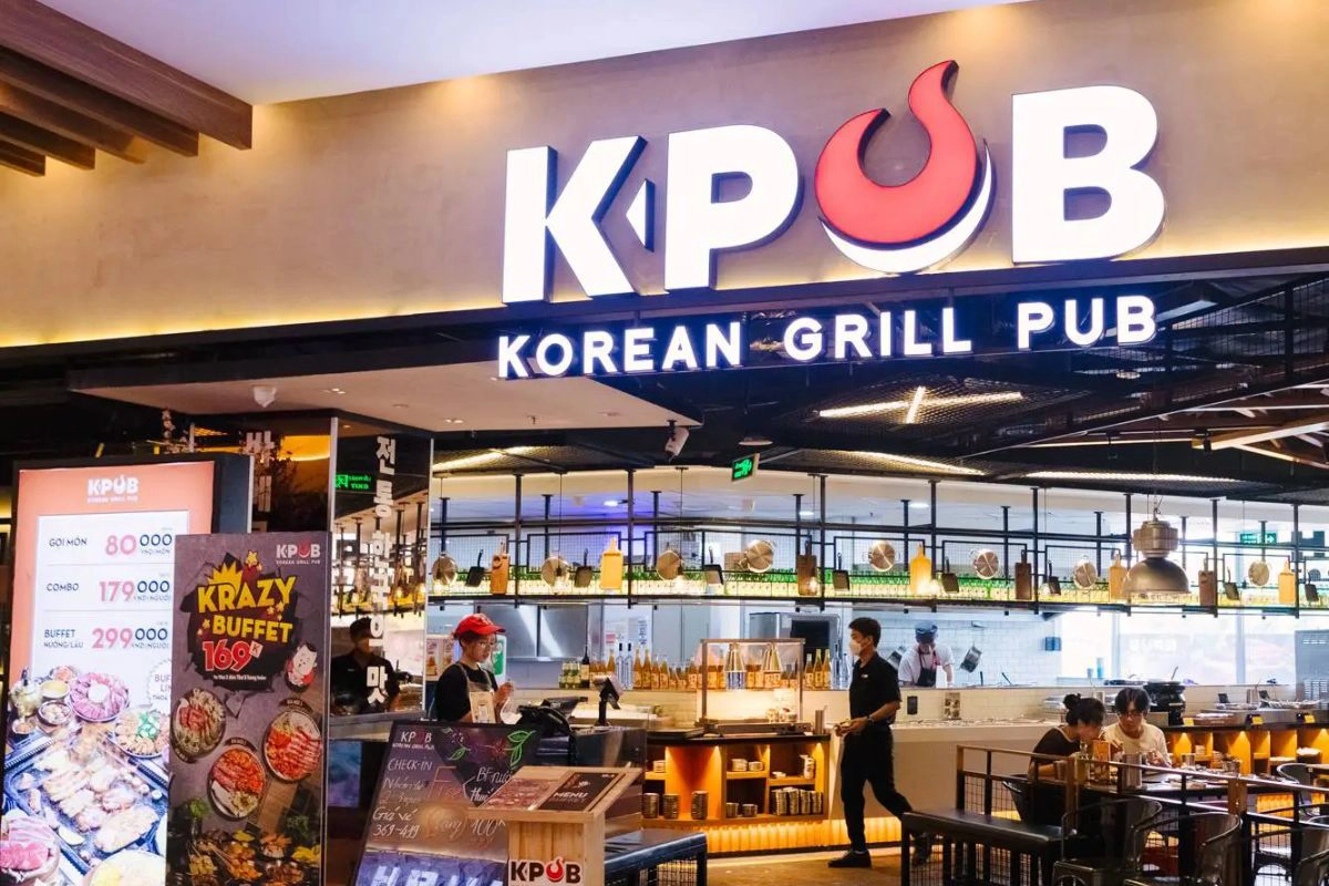 Casual pork barbecue served at round metal tables