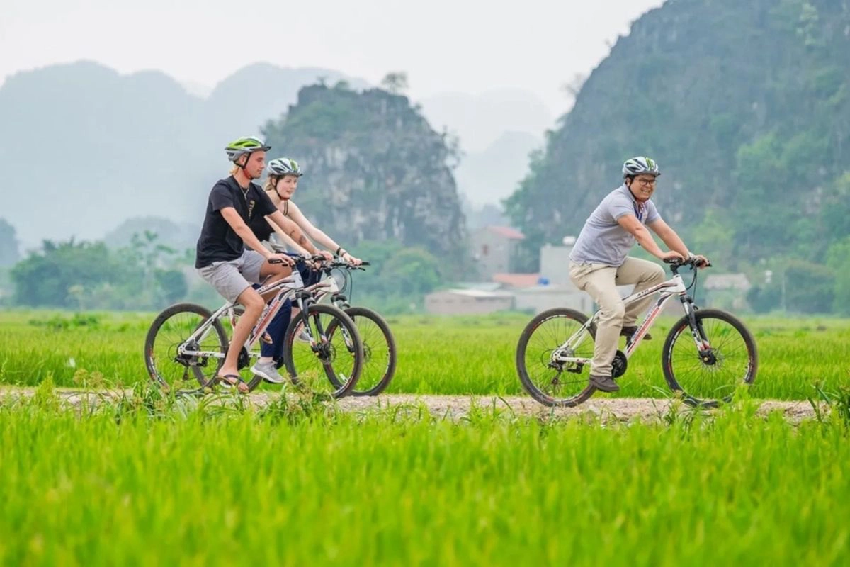 Cycling is a scenic way to reach Mua Cave from Tam Coc