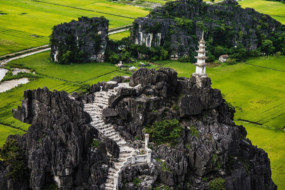 Mua Cave rewards the climb with sweeping views over Tam Coc