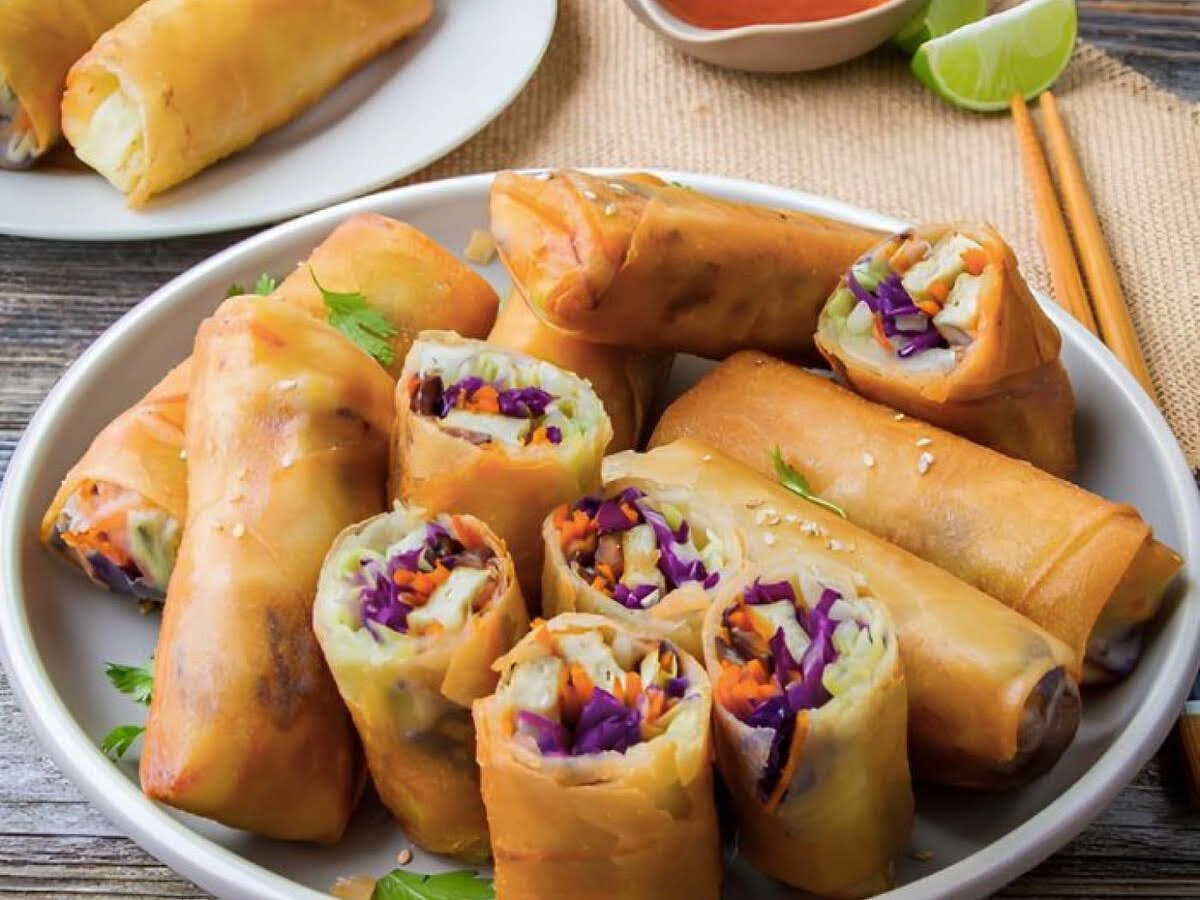 Crispy vegan fried spring rolls with vegetables and tofu