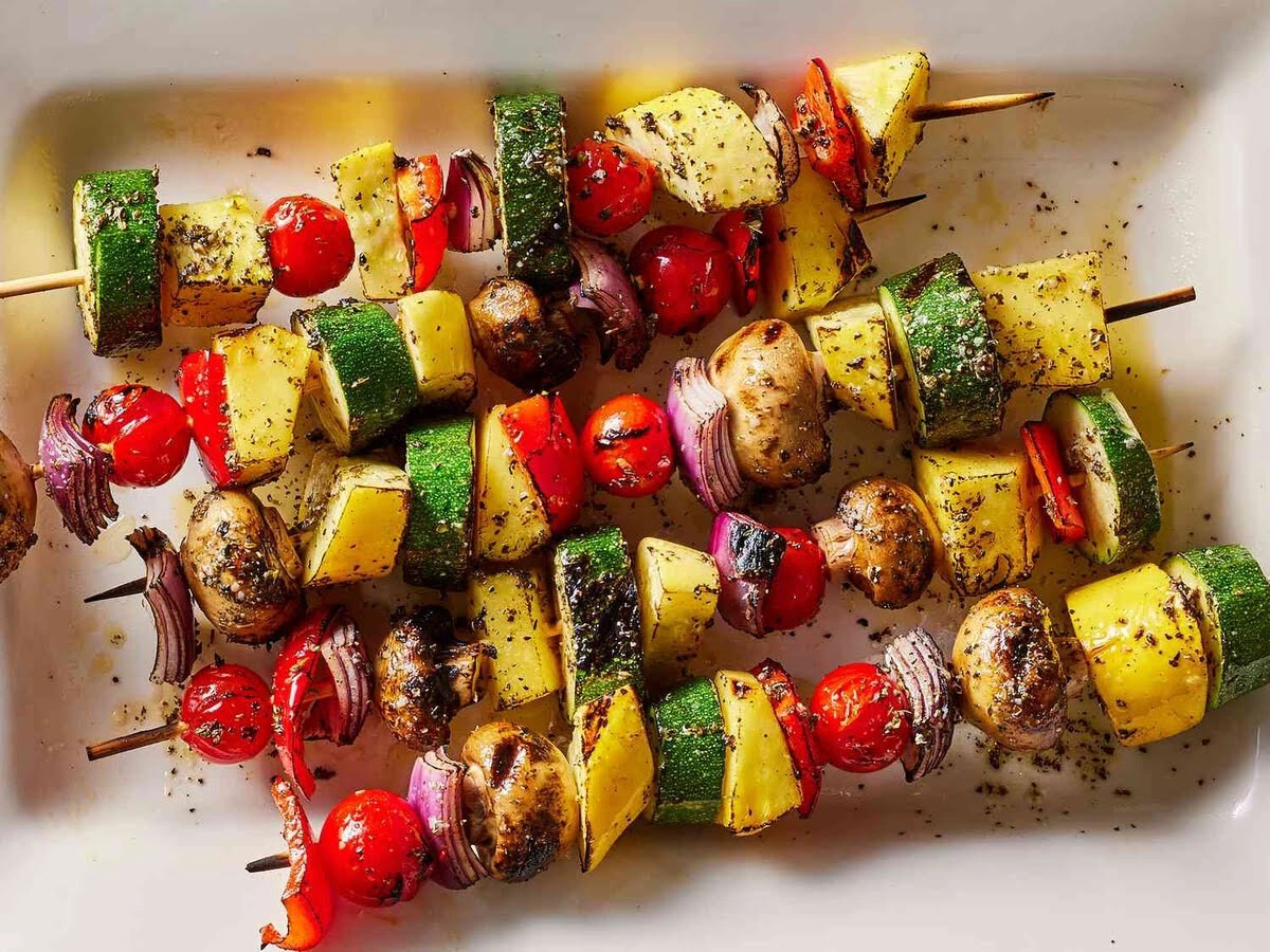Grilled vegetable skewers with tofu, mushrooms, and marinade