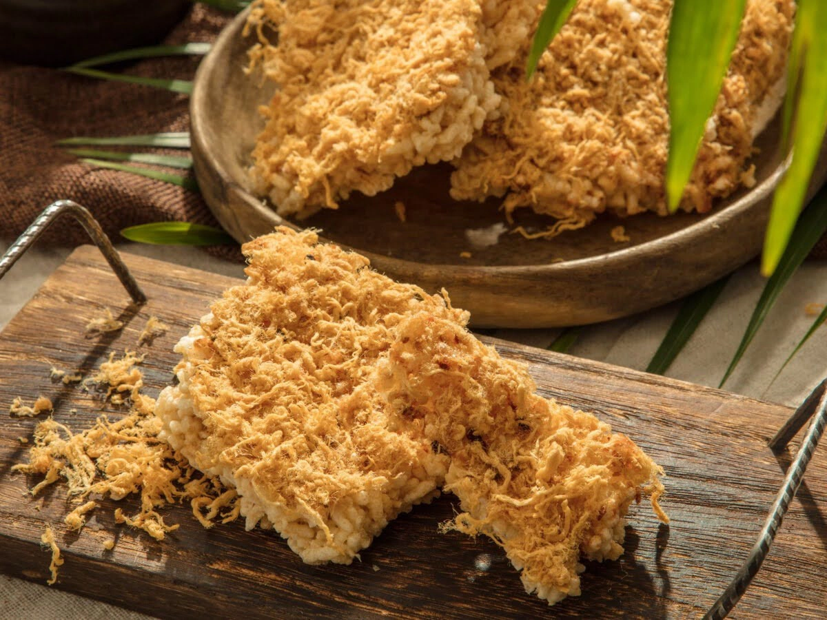 Crispy rice crackers topped with shredded pork floss, a popular affordable local snack 