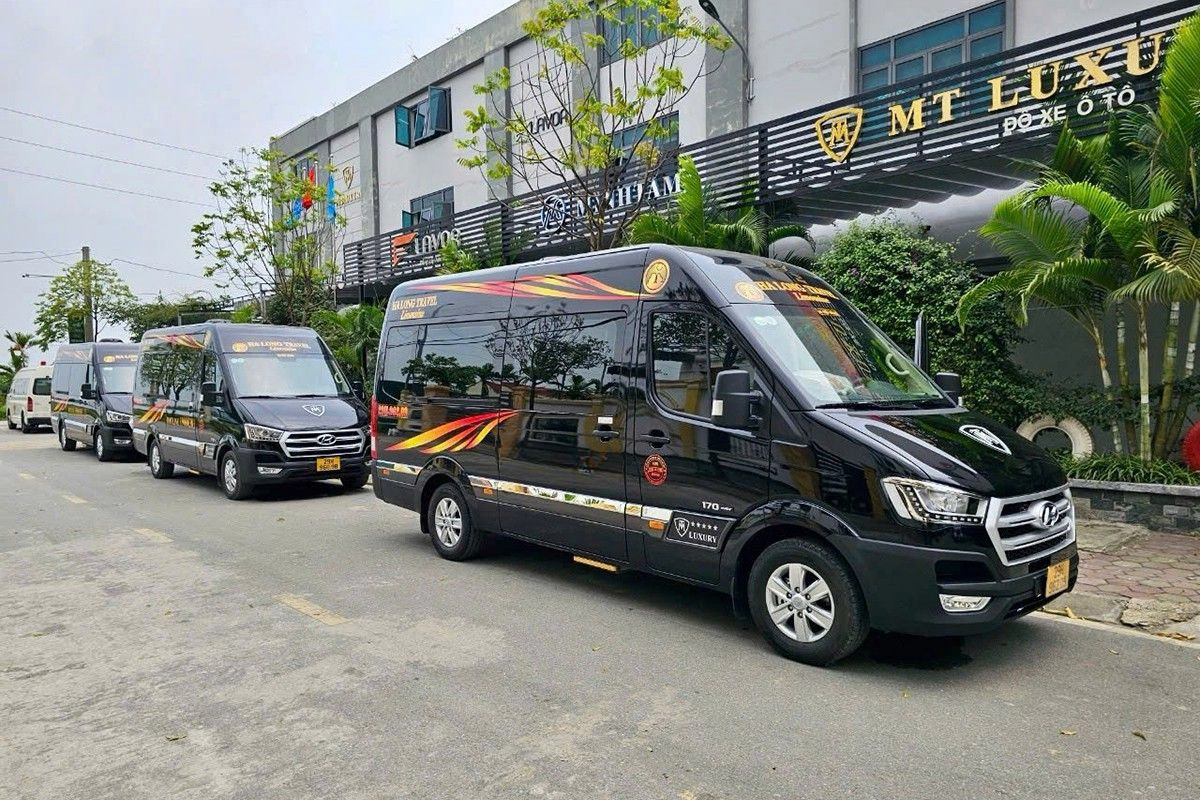 Luxury limousine van driving on a modern highway