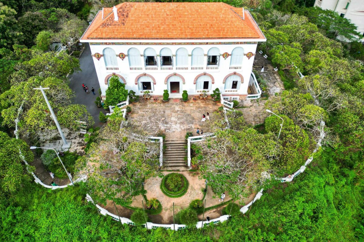 Green gardens surround the villa and overlook Vung Tau's coastline