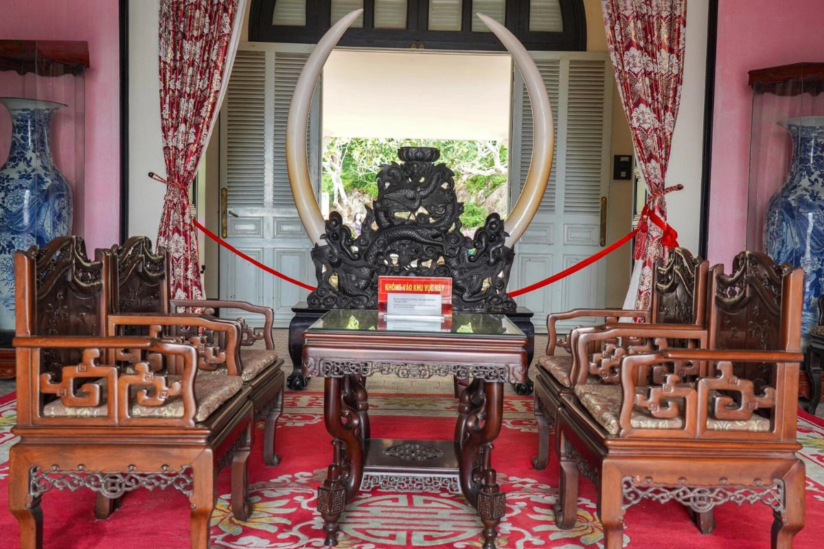 Historic rooms display furniture, ceramics, and objects from different periods